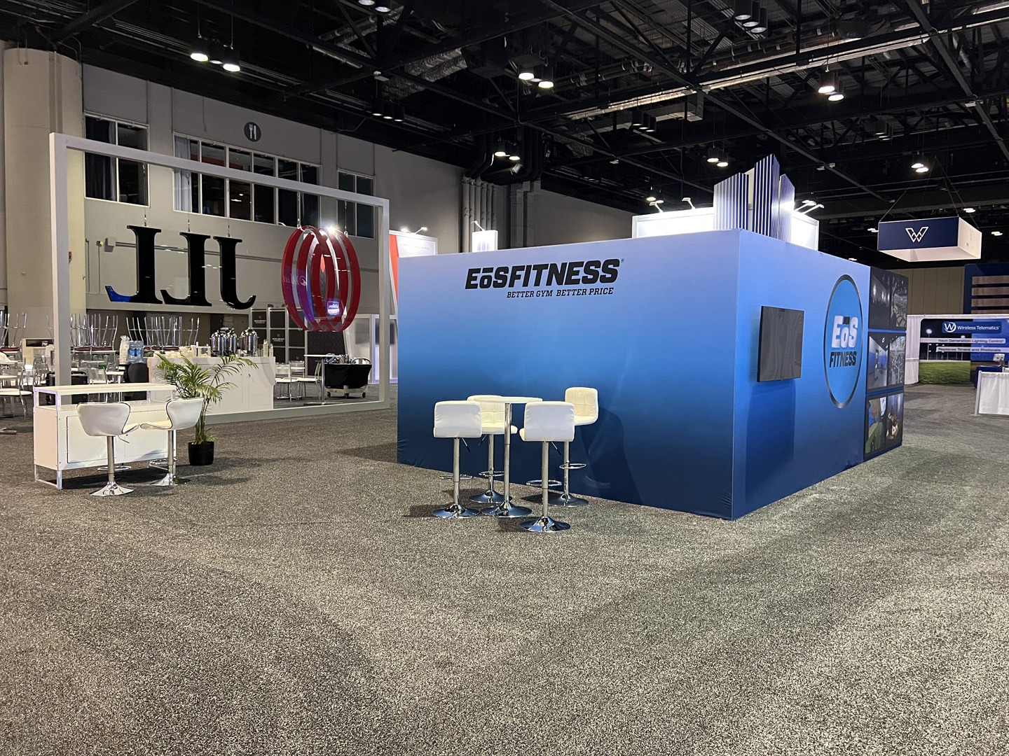 EoS Fitness at ICSC Florida, using custom trade show counters and graphic design by TSD Counters in Boise, Idaho.